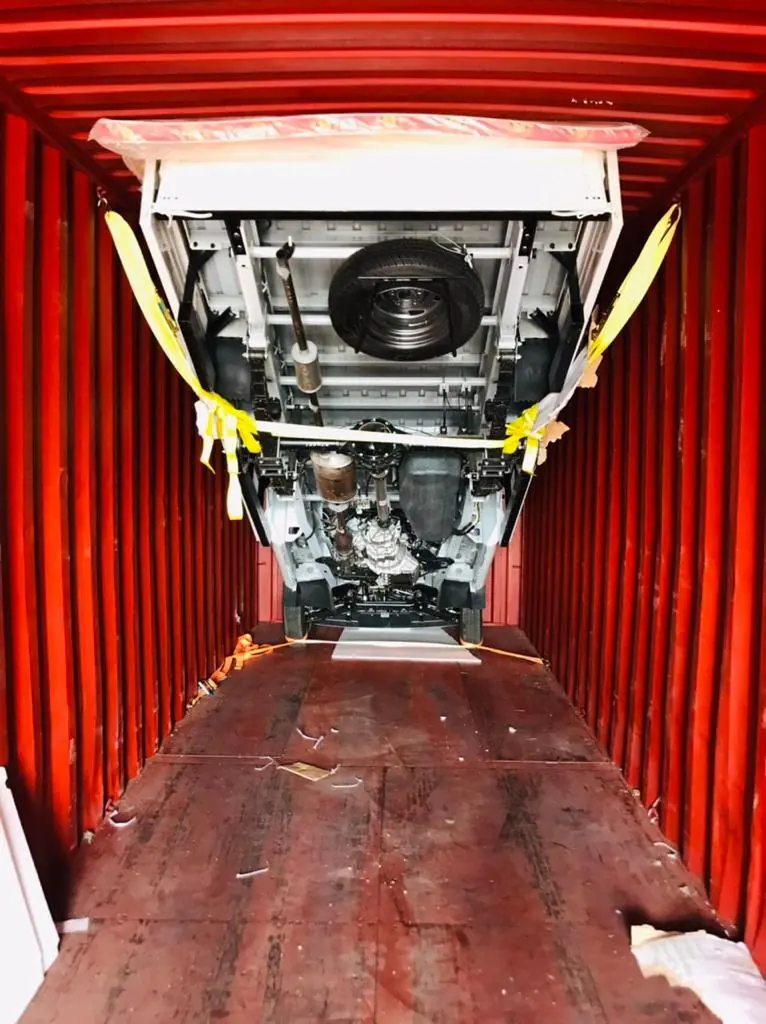 Vehicle lashed inside a shipping container by Belsped Shipping