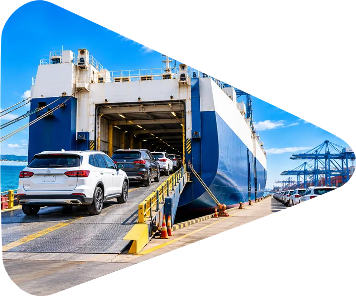 Cars driving onto a RoRo car carrier ship for vehicle shipping from Dubai